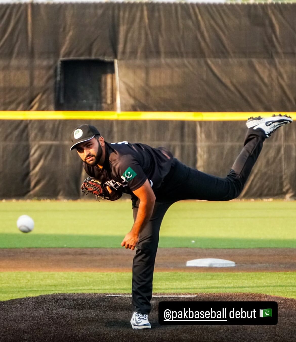 Pakistan pitcher mid-throw — @pakbaseball debut