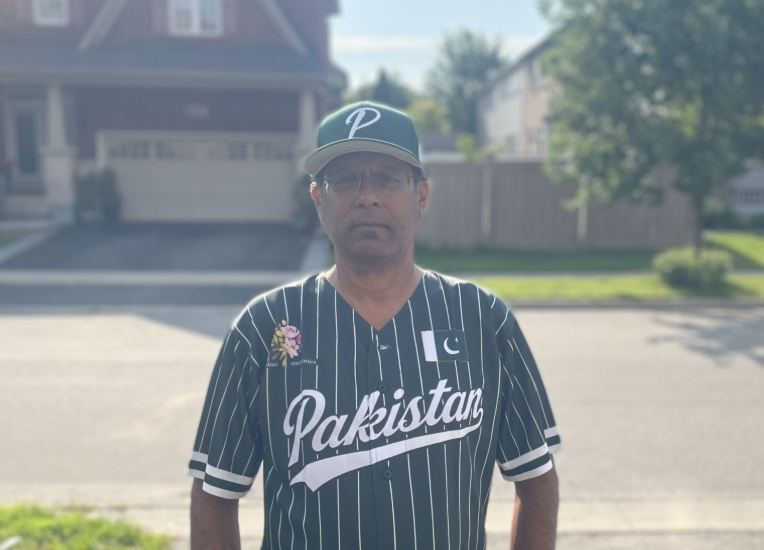 Hussain Ansari in Pakistan baseball pinstripe jersey